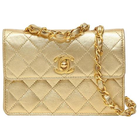 gold plated chanel bag|Chanel bag with gold chain.